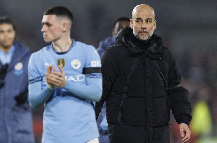 Pep Guardiola (der.)