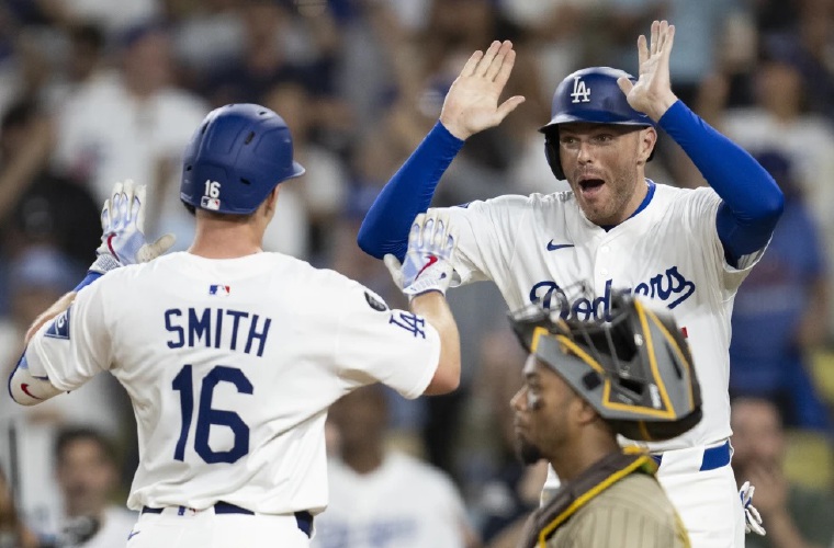 Will Smith (i) y Freddie Freeman.
