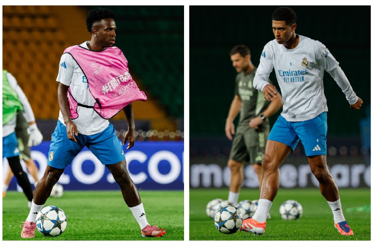 Vinicius (izq.) y Judge Bellingham entrenan para el juego de hoy.
