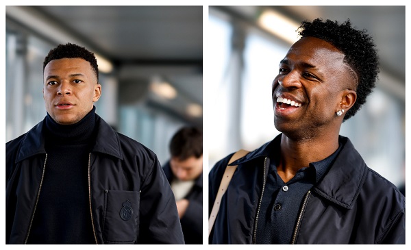 Kylian Mbappé (izq.) y Vinicius al llegar a Lisboa para el partido de mañana martes. Fotos: Real Madrid FC
