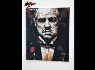 El cartel del actor Marlon Brando en la película 'El Padrino' colgado en una pared dentro del escondite de Matteo Messina Denaro en Campobello di Mazara, Italia. EFE