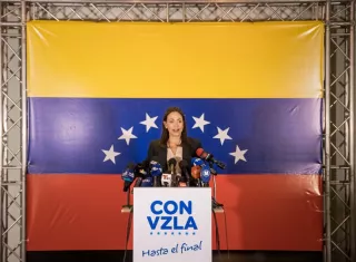 La exdiputada María Corina Machado, ofrece declaraciones a periodistas ayer, en Caracas (Venezuela). EFE