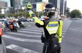China estrena su escuadrón de polícias de tránsito robótico. ¡Anticoima!