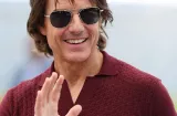 Tom Cruise y Robbie Williams en la clausura del Mundial
