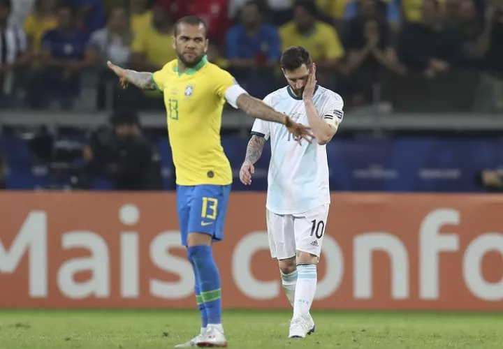 Dani Alves y Lionel Messi