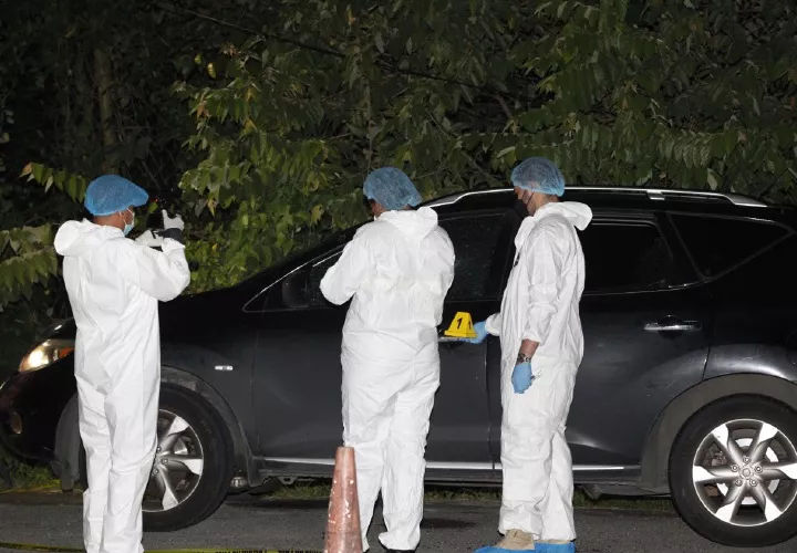 Autoridades en el levantamiento del cuerpo de la víctima, Foto: Alexander Santamaria
