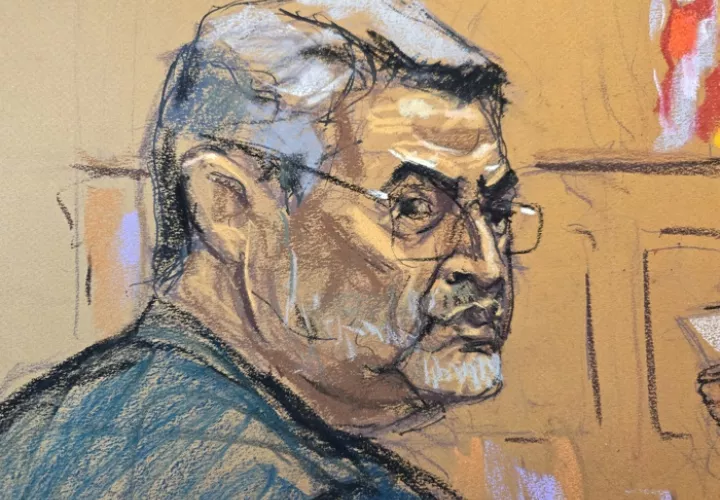 Reproducción fotográfica de un dibujo donde aparece el expresidente de Honduras Juan Orlando Hernández.EFE