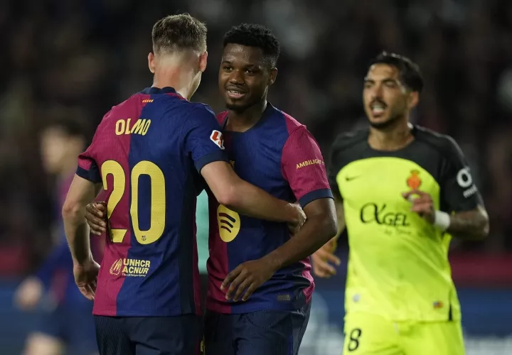 Dani Olmo (i) y Ansu Fati