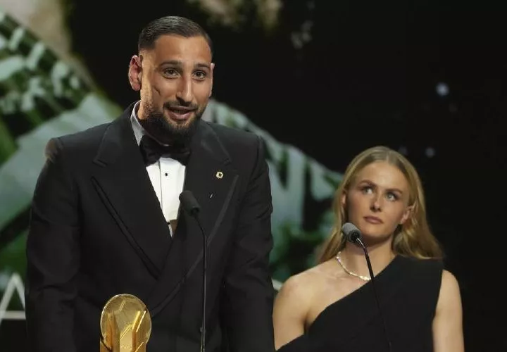 Hanna Hampton (d) y Gianluigi Donnarumma.